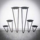 Fem metallben för möbler i olika storlekar.