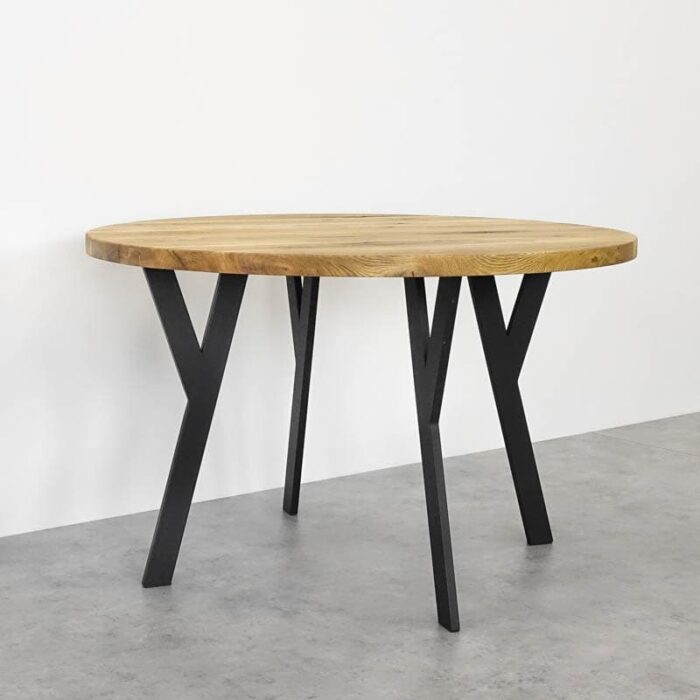 Bordsben-Y-Metall-Svart-6.jpg Runt träbord med svarta metallben.
