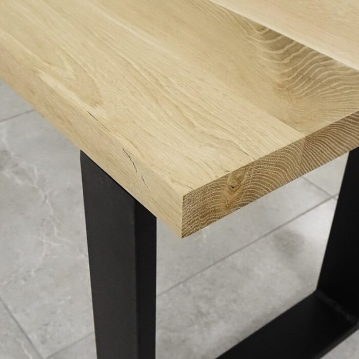 Bordsskiva-Naturwood-Obehandlad2.jpg Träbordshörna med svart metallben