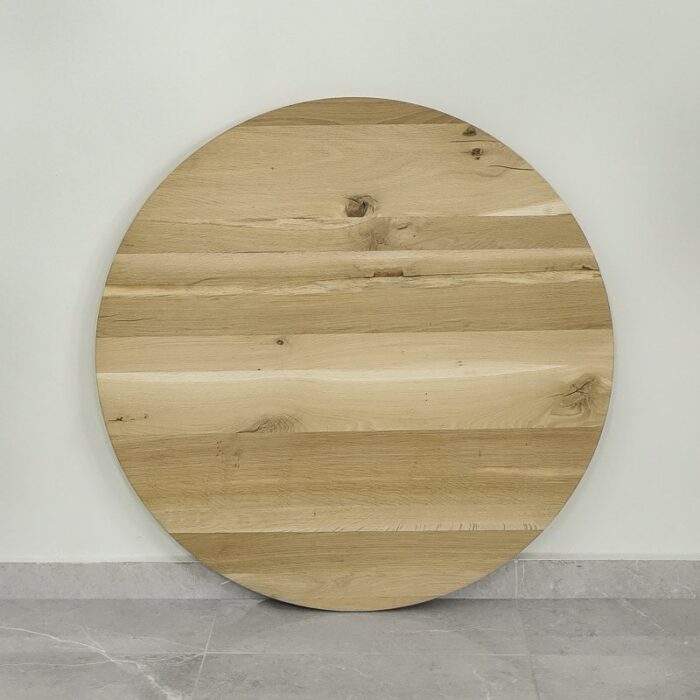 Bordsskiva-Round-100-cm-obehandlad9.jpg Rund träskiva på marmorgolv