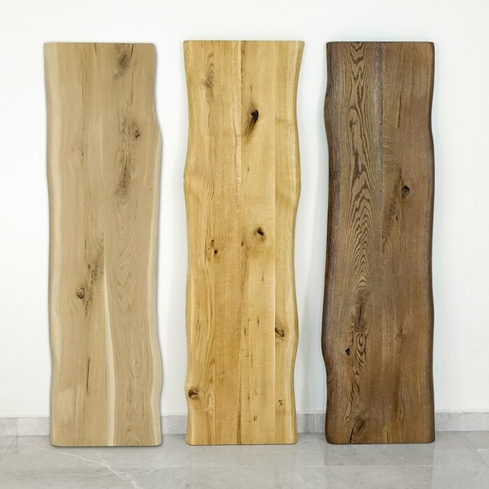 Bordsskiva-Wood-1-Grundoljad-Brun12.jpg Tre olika träplankor mot vägg